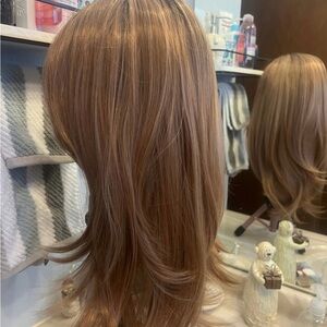 IM style lace front synthetic strawberry blonde wig. New not worn